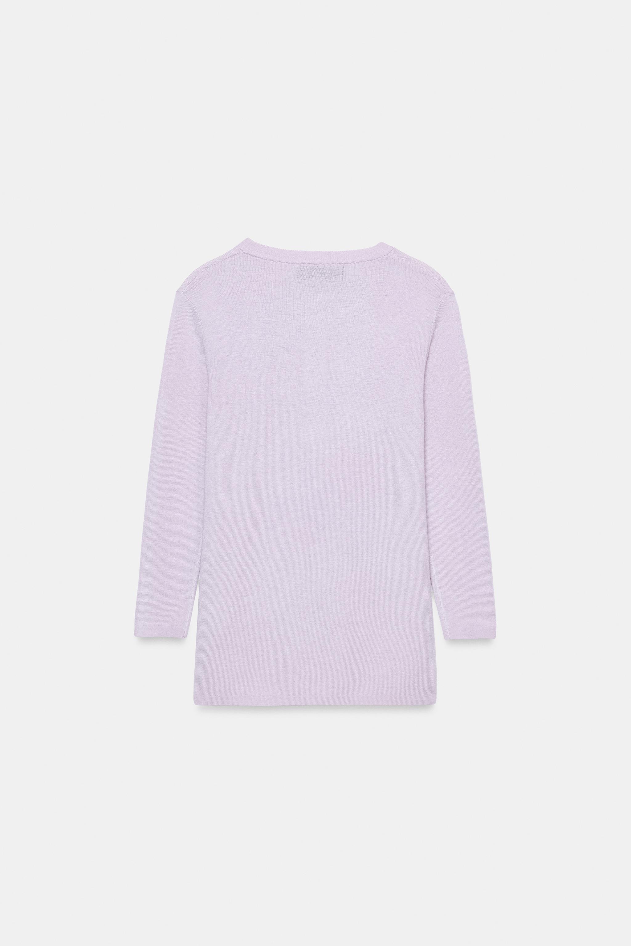 PULL EN MAILLE À BOUTONS